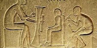 an ancient drawing on a wall depicting people talking